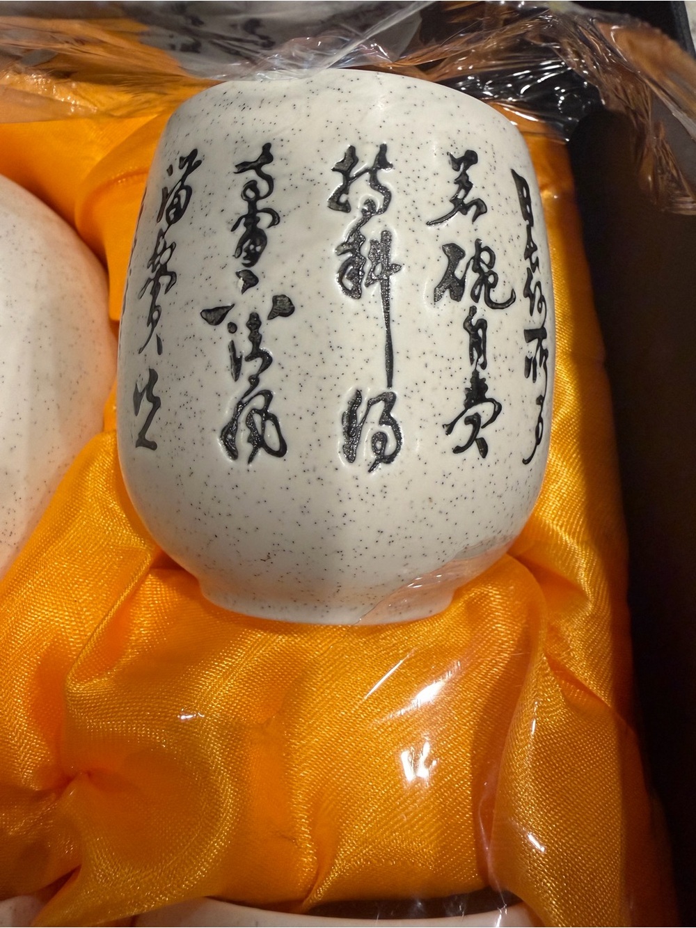 Handcrafted White Ceramic Calligraphy Tea Cup